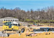  ?? APRIL GAMIZ/THE MORNING CALL ?? Avenue, recently Heavy equipment is seen at the Palmer Pointe luxury apartment complex, with a clubhouse and playground set shown in the background, in Palmer Township. The complex is one of several projects being planned along a short stretch of Hartley Avenue.