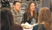  ?? CBS Films ?? Jake Lacy (left) and Olivia Wilde in the Christmas-themed movie “Love the Coopers.”