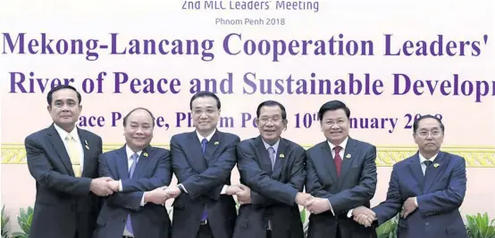  ??  ?? Chinese Premier Li Keqiang (third from left) attends the second Lancang-Mekong Co-operation (LMC) leaders’ meeting in Phnom Penh, Cambodia, January 10, 2018. Cambodian Prime Minister Samdech Techo Hun Sen and Li Keqiang co-chaired the meeting, which...