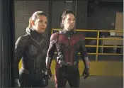  ?? Ben Rothstein / Associated Press ?? Evangeline Lilly, left, as the Wasp, and Paul Rudd.