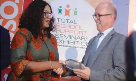 ??  ?? The Finland Ambassador to Nigeria, Dr. Jyrki Pulkkinen, being presented with an award by the Managing Director, Edumark Consult, Mrs. Yinka Ogunde, during the 11th TOSSE in Lagos… recently