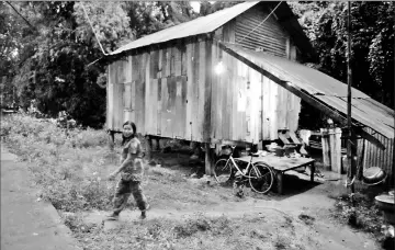  ??  ?? Nary’s mother at their home just outside Phnom Penh.