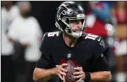  ?? AP PHOTO/JOHN BAZEMORE, FILE ?? FILE - Atlanta Falcons quarterbac­k Josh Rosen works against the Cleveland Browns during the second half of a preseason NFL football game, Sunday, Aug. 29, 2021, in Atlanta.