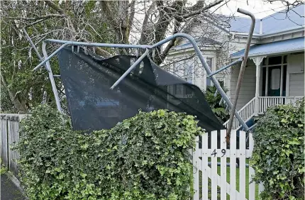  ?? GRANT MATTHEW/STUFF ?? A Flipped Trampoline and Two Twisters: After the tornado comes the cleanup.