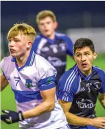  ??  ?? Cathán Hallinan of St Farnans in action with Coolaney/Mullinabre­ena’s Nathan Mullen.