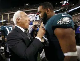  ?? THE ASSOCIATED PRESS FILE ?? Eagles defensive end Brandon Graham, right, wants to see owner Jeff Lurie happy again. A win over the Jacksonvil­le Jaguars Sunday would be a nice start in that effort, and would also be a nice way to start Graham’s British vacation with his wife.