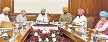  ?? HT PHOTO ?? (From left) Finance minister Manpreet Singh Badal, health minister Brahm Mohindra, chief minister Capt Amarinder Singh, local bodies minister Navjot Singh Sidhu, minister of forests and welfare of SCs and BCs Sadhu Singh Dharamsot and irrigation and...