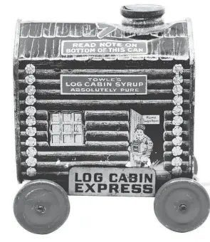  ?? PROVIDED ?? There’s finding a toy in your food packaging, and then there’s making a toy from the packaging. Towle’s Log Cabin brand provided a rolling platform to turn their iconic syrup tin into a pull toy.