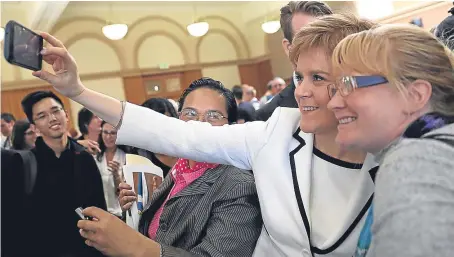  ?? Picture: Getty Images. ?? Nicola Sturgeon takes a selfie with an attendee at the event at Stanford University last night.