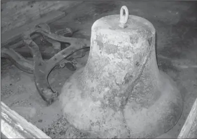  ?? Courtesy Photo ?? Old Bell: The old Bethel Methodist Church found the school bell last summer underneath the center of the church. The missing bell has been holding the church up since 1938. What looks like a crack in the bell is actually a heavy rust line where the...