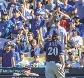  ?? Robert Gauthier Los Angeles Times ?? BREWERS LEFT-HANDER Wade Miley started and faced one batter against the Dodgers in Game 5 of the National League Championsh­ip Series.