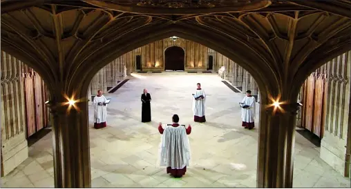  ??  ?? SPREAD OUT: The four singers, including Australian-born classical soprano Miriam Allan, second left, performing during yesterday’s service