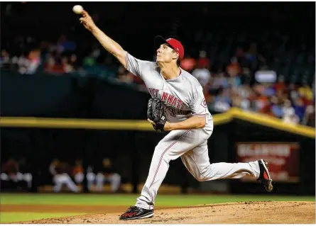  ?? CHRISTIAN PETERSEN / GETTY IMAGES ?? The Reds’ Homer Bailey allowed one run on seven hits and four walks while striking out five in 62/3 innings Sunday. It was the right-hander’s second straight strong start after allowing one run in six innings at Colorado on Tuesday.