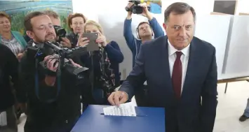  ?? — Reuters ?? Milorad Dodik, President of Republika Srpska, votes for a referendum on their Statehood Day in Laktasi near Banja Luka, Bosnia and Herzegovin­a, on Sunday.