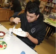  ?? (Staff photo by Mallory Wyatt) ?? Senior Jason Balderas said he has made six pieces of pottery in Giselle Galvan’s class and has been interested in art for the four years he has been in high school.