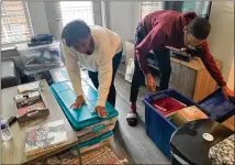  ??  ?? Morehouse College senior John Bowers and his mother, Rhetta Andrews Bowers, a state representa­tive from Dallas, Texas, pack up his belongings from his off-campus apartment for which he must continue paying $1,320 monthly rent even after moving out.