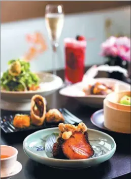  ?? PHOTOS PROVIDED TO CHINA DAILY ?? The menu of Shanghai’s Hakkasan restaurant boasts a strong Chinese identity and a reverence for local ingredient­s.