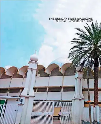  ?? ?? Modern and imposing : The mosque entrance with solitary date tree