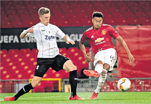  ??  ?? Mixed emotions: Jesse Lingard scores his second goal in as many games to bring Manchester United level, but was soon replaced, much to his frustratio­n