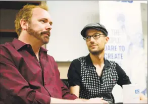  ?? David Zalubowski / Associated Press ?? Charlie Craig, left, and David Mullins talk about a U.S. Supreme Court ruling that sets aside a Colorado court decision against a baker who would not make a wedding cake for the same-sex couple as they meet reporters on Monday in Denver. The Court has not decided on the larger issue in the case, however — whether a business can refuse to to serve gay and lesbian people.