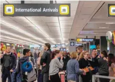  ?? — AFP ?? US officials appealed for patience on Sunday as travellers returning to the United States over the weekend were met by long lines and massive delays at major airports so they could be screened for the coronaviru­s.