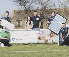  ??  ?? THANK YOU: Greg and Amy with members of Queensbury RLFC