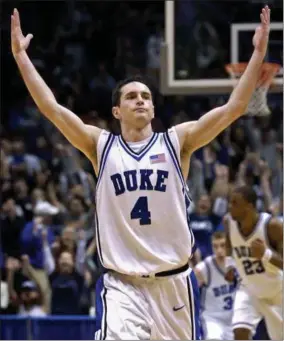  ?? BILL KOSTROUN — THE ASSOCIATED PRESS FILE ?? In this Dec. 10, 2005 photo, Duke’s J.J. Redick reacts after hitting a three-point shot during the second half of an NCAA college basketball game against Texas in East Rutherford, N.J. More than a decade after his final game at Duke, the 2006 national...