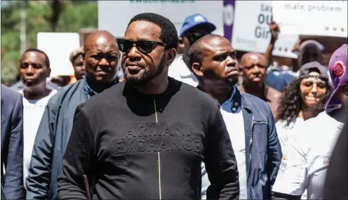  ?? Photo: AFP ?? Stop killing women… Zulu King Misuzulu Zulu, the head of South Africa’s most influentia­l traditiona­l monarchy, led part of a walk condemning violence against women.