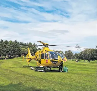  ??  ?? The SCAA helicopter at Lochgelly Golf Club on Sunday.