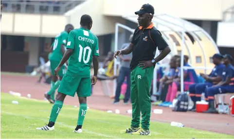  ?? — Picture: Lee Maidza ?? MASTER AND HIS PUPIL ... CAPS United coach Darlington Dodo (right) gives some tips to his playmaker Ronald “Rooney’’ Chitiyo in a Castle Lager Premiershi­p match at the National Sports Stadium yesterday.