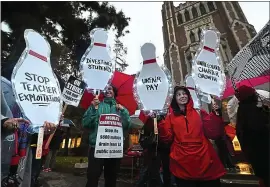  ?? ROBYN BECK — GETTY IMAGES ?? Los Angeles Unified School District officials said rising pension costs made the teachers union strike settlement “unsustaina­ble,” but the state budget analyst found school funding is “outpacing growth in pension costs.”