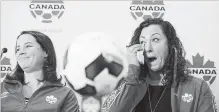  ?? CANADIAN PRESS FILE PHOTO ?? Rhian Wilkinson, left, and Melissa Tancredi of Canada's women's soccer team announce their retirement in Vancouver on Jan. 13, 2017.