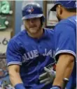  ?? MIKE CARLSON/THE ASSOCIATED PRESS ?? Blue Jay Josh Donaldson will test out injured calf Tuesday before making the call for home opener.