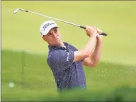  ?? Charles Krupa / Associated Press ?? Justin Thomas plays a shot from a bunker on the 17th hole during the first round of the U.S. Open on Thursday in Mamaroneck, N.Y.