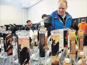  ?? JOHN LAW THE NIAGARA FALLS REVIEW ?? Left: There were bongs aplenty at Niagara Falls’ first-ever Falls 420 Expo, held Saturday at Scotiabank Convention Centre. The event celebrated all things cannabis.