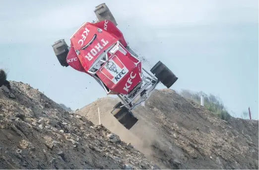  ?? Pictures: AFP ?? DIRTY BUSINESS. Driver Thor Palsson competes in his heavily modified 4x4 truck in the “Formula Offroad” (torfaera in Icelandic) championsh­ip on the mountain Akrafjall, overlookin­g the small town of Akranes, that has been turned into a temporary race track.