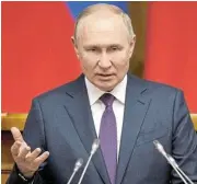  ?? /Reuters ?? Wanted: An arrest warrant has been issued for Russian President Vladimir Putin, who is accused of committing war crimes.