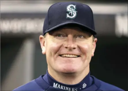  ?? ELAINE THOMPSON — THE ASSOCIATED PRESS FILE ?? In this Sept. 25, 2013 photo, then-Seattle Mariners manager Eric Wedge smiles before a baseball game against the Kansas City Royals, in Seattle. Former Cleveland and Seattle manager Eric Wedge has become the second person to interview with the New York...