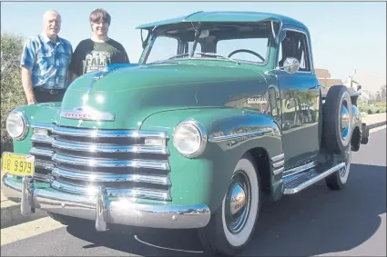  ?? PHOTO BY DAVID KRUMBOLTZ ?? Hayward residents Dale, left, and son Eric Townsend appear recently with Dale Townsend’s 1948 Chevrolet Deluxe Cab half-ton pickup truck.