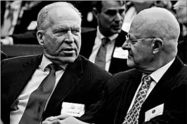  ?? SAUL LOEB/AFP 2013/GETTY IMAGES ?? Ex-CIA Director John Brennan, left, and former Director of National Intelligen­ce James Clapper on Sunday criticized the president’s dealings with his foreign counterpar­ts.