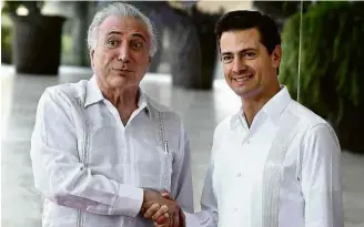  ?? Alfredo Estrella/AFP ?? Temer e o presidente do México, Enrique Peña Nieto, em Puerto Vallarta