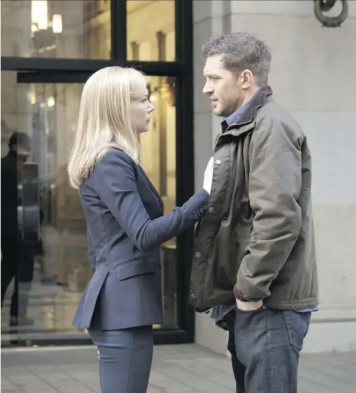  ?? SONY PICTURES ?? Four-time Oscar nominee Michelle Williams, left, stars with Tom Hardy in the big-budget Venom.