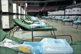  ?? PHOTO COURTESY CITY OF PHILADELPH­IA ?? Beds are set up at the Liacouras Center at Temple University, which will be used to treat recovering COVID patients. Montgomery County staffing firm General Healthcare Resources is finding staff for the facility.