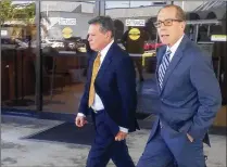  ?? JANE MUSGRAVE / THE PALM BEACH POST ?? Dr. Gary Marder (left) and his attorney, Richard Lubin, leave the federal courthouse Wednesday after Marder pleaded guilty to health care fraud and obstructin­g a criminal investigat­ion. He faces a 15-year prison term and $500,000 fine.