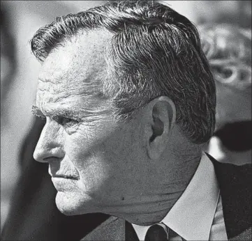  ?? MCCLATCHY-TRIBUNE 2000 ?? War hero, father and president were among the titles for George H.W. Bush, whose life was largely dedicated to public service.