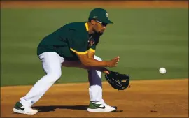 ?? JANE TYSKA — STAFF PHOTOGRAPH­ER ?? Athletics shortstop Marcus Semien likely will miss Friday’s game with pain in his left side.