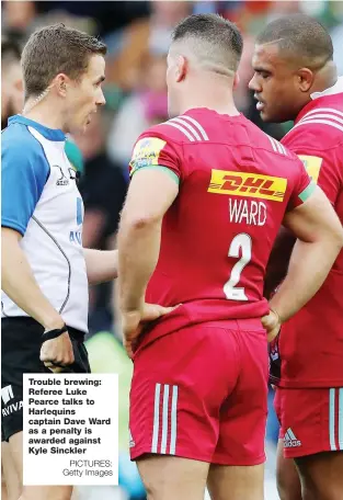  ?? PICTURES: Getty Images ?? Trouble brewing: Referee Luke Pearce talks to Harlequins captain Dave Ward as a penalty is awarded against Kyle Sinckler