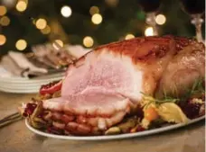  ?? ISTOCK PHOTOGRAPH­Y PHOTOS ?? Ham is another tasty option for a holiday dinner main.