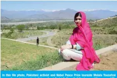  ?? —AFP ?? In this file photo, Pakistani activist and Nobel Peace Prize laureate Malala Yousafzai poses for a photograph at all-boys Swat Cadet College Guli Bagh, near Mingora.