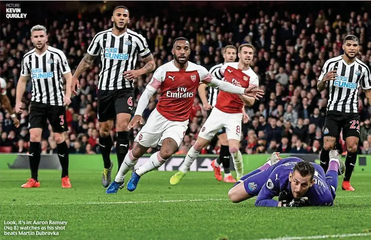  ?? PICTURE: KEVIN QUIGLEY ?? Look, it’s in: Aaron Ramsey (No 8) watches as his shot beats Martin Dubravka